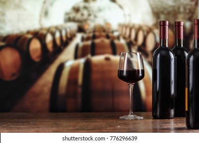 Wine cellar with wine bottle and glasses.with space for text