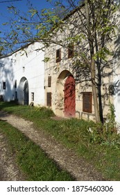 Wine Cellar Entrance With The Door Closed.