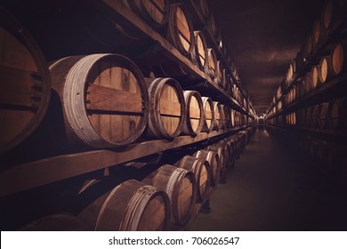 Wine cellar with a row of barrels, Austria