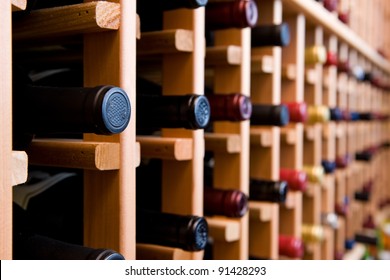 Wine Cellar with Stacks of Bottles