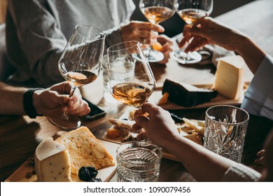 Wine And Cheese Served For A Friendly Party In A Bar Or A Restaurant.