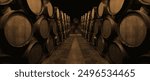 Wine or cognac barrels in the cellar of the winery, Wooden wine barrels in perspective. wine vaults. vintage oak barrels of craft beer or brandy