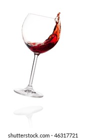 Wine collection - Red wine in falling glass. Isolated on white background