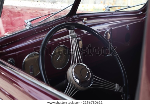 wine color antique car\
interior