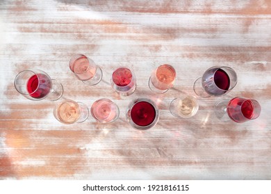 Wine Colors. Many Glasses Of White, Rose, And Red Wine, Overhead Flat Lay Shot