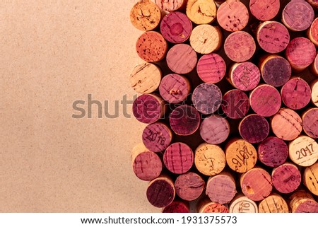 Wine corks background texture, a design template for a restaurant banner or tasting invitation, overhead shot with copy space