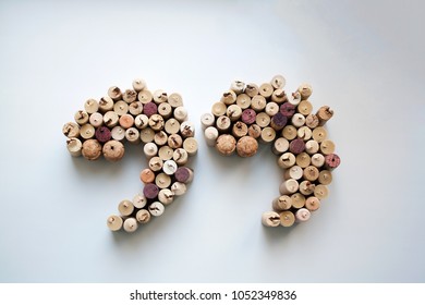 Wine corks quotation marks silhouette isolated on white from a high angle view