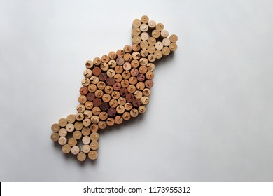 Wine Corks Wrapped Candy Abstract Composition Isolated On White Background From A High Angle View