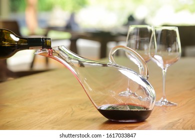 Wine decanter. Decanting wine ensures that the sediment stays in the bottle and you get a nice clear wine and second and more everyday reason to decant is to aerate the wine.