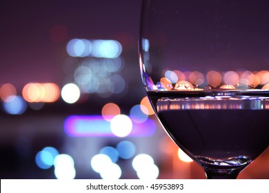 Wine Glass With Light Bokeh In Background