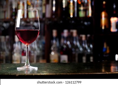 Wine Glass On The Background Of The Bar