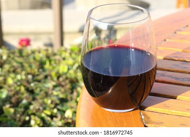 A wine glass on a table