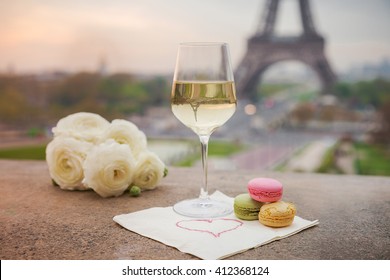 Wine Glasses And Eiffel Tower In Paris Spring
