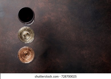 Wine Glasses On Stone Table. Top View With Space For Your Text