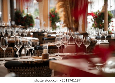 wine glasses on table in fancy restaurant by the sea - Powered by Shutterstock