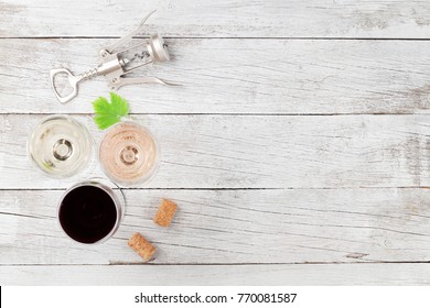 Wine glasses on wooden table. Top view with space for your text - Powered by Shutterstock