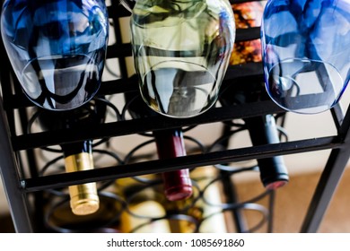 Wine Glasses, Rack, and Bottles