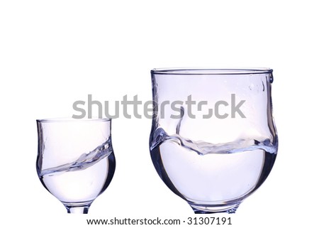 wine glasses with water splash isolated on white