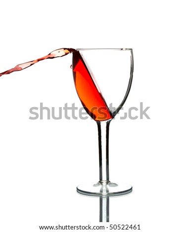 wine pouring out of glass isolated on white