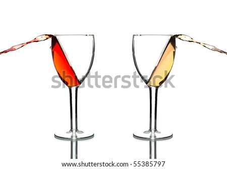 wine pouring out of glasses isolated on white