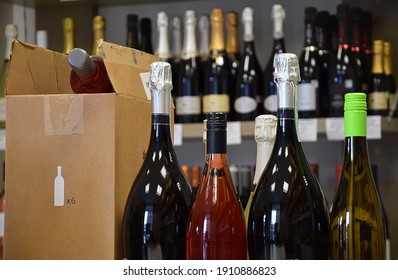 The wine is put in a box and ready for home delivery    
Wine bottles in wine store and ready for home delivery
