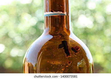 Wine Sediment On The Stele Brown Bottle Of Red Wine