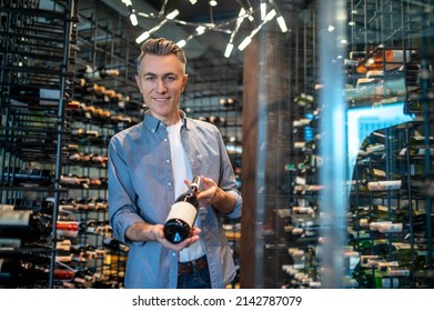 A Wine Store Owner Making A Revision And Looking Busy