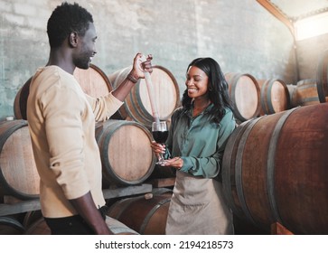 Wine Tasting, Couple And Distillery Farm Worker Serving Red Alcohol Drink In Glass With Pipette In Countryside. Happy Smile, Learning Man And Woman Or Winery Waiter On Sustainability Luxury Vineyard