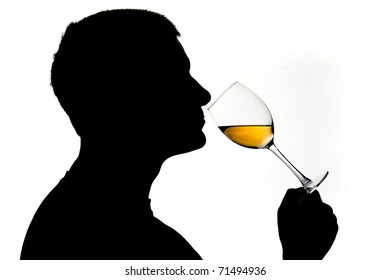 Wine tasting with human figure in silhouette and white wine