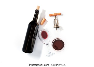 Wine Tasting, Overhead Flat Lay Shot On A White Background, With A Cork, A Vintage Corkscrew, A Bottle And Two Glasses