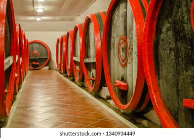 Wine Wooden Barrels In The Private Cellar