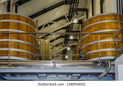 Wine Wooden Barrels In The Private Cellar