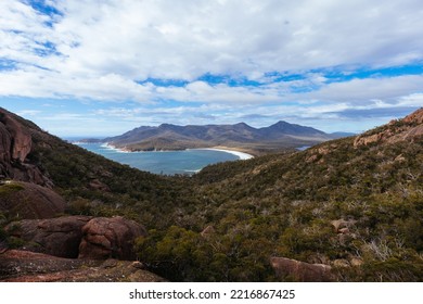 Wineglass Bay From The Lookout On The Freycinet Peninsula Circuit Day Hike On A Warm Wet Spring Day In Freycinet National Park, Tasmania, Australia