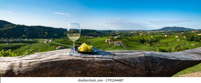 Wineglass With Grapes On A Wood Table, Italian Wine, Glass Of White Wine 