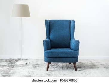 Wing Back Chair On A Carpet No People