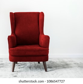 Wing Back Chair On A Carpet No People