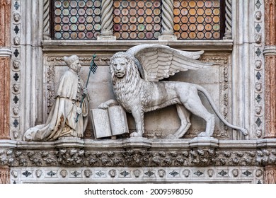 Winged lion, symbol of the city, with the Doge, on the Doge's Palace (Palazzo Ducale), San Marco, Venice.