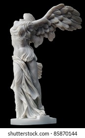 winged victory of samothrace small replica isolated on black background