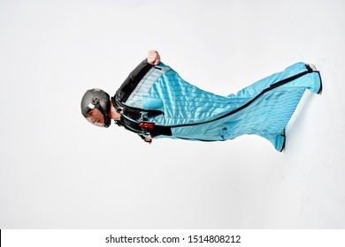 Wingsuit Flying. Wing Men In Wing Suit Templet. Skydiving Men In Parashute. Simulator Of Free Fall.