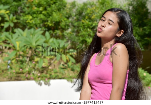 Winking Filipina Teen Girl Stock Photo Edit Now