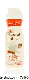 Winneconne, WI - 1 December 2017:  A Bottle Of Coffee Mate Natural Bliss Coffee Creamer In Cinnamon Flavor On An Isolated Background.