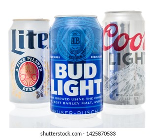 Winneconne, WI - 10 June 2019 : A Collection Of American Top Light Beers Including Coors Light, Bud Light And Miller Lite On An Isolated Background