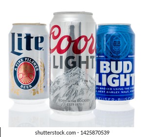 Winneconne, WI - 10 June 2019 : A Collection Of American Top Light Beers Including Coors Light, Bud Light And Miller Lite On An Isolated Background