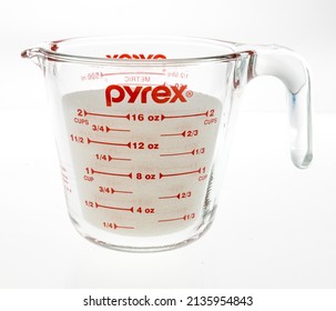 Winneconne, WI -11 March 2021: A package of Pyrex measuring cup on an isolated background