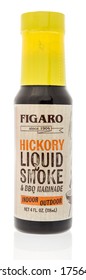 Winneconne,  WI - 12 June 2020: A Bottle Of Figaro Hickory Liquid Smoke On An Isolated Background