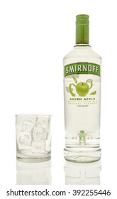 Winneconne, WI - 15 March 2016:  A Bottle Of Smirnoff Green Apple Vodka With A Glass Of Ice