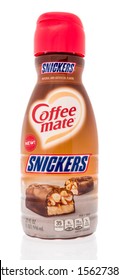 Winneconne, WI - 16 November 2019: A  Package Of Coffee Mate Creamer In Snickers Flavor On An Isolated Background