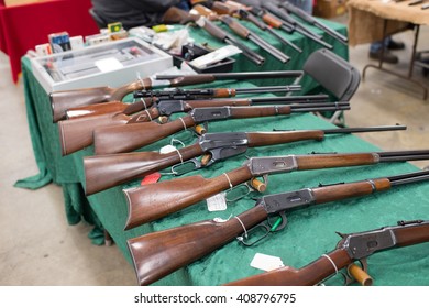 Winneconne, WI - 17 April 2016:  Image Of Rifles On A Table At A Gun Show.