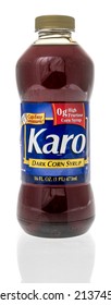 Winneconne, WI -19 March 2021: A Bottle Of Karo Dark Corn Syrup On An Isolated Background