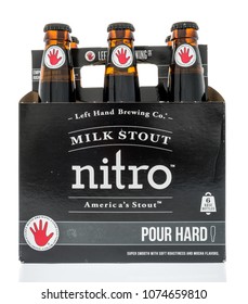 Winneconne, WI -  20 April 2018: A Six Pack Of Left Hand Milk Stout Nitro Beer On An Isolated Background.